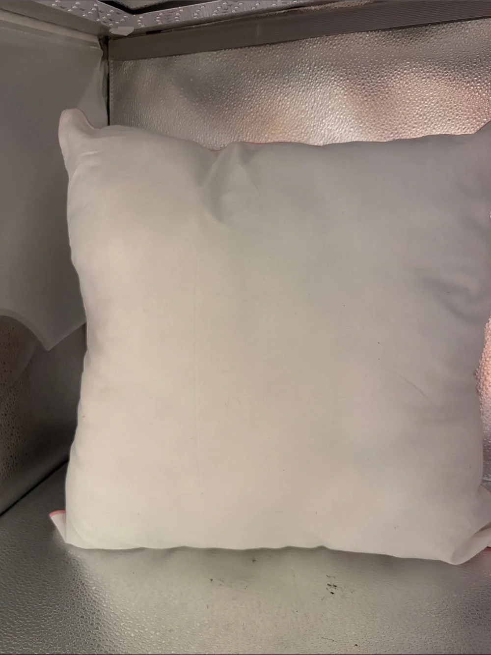 Water color pillows.One square and rectangle with roses and greenery.